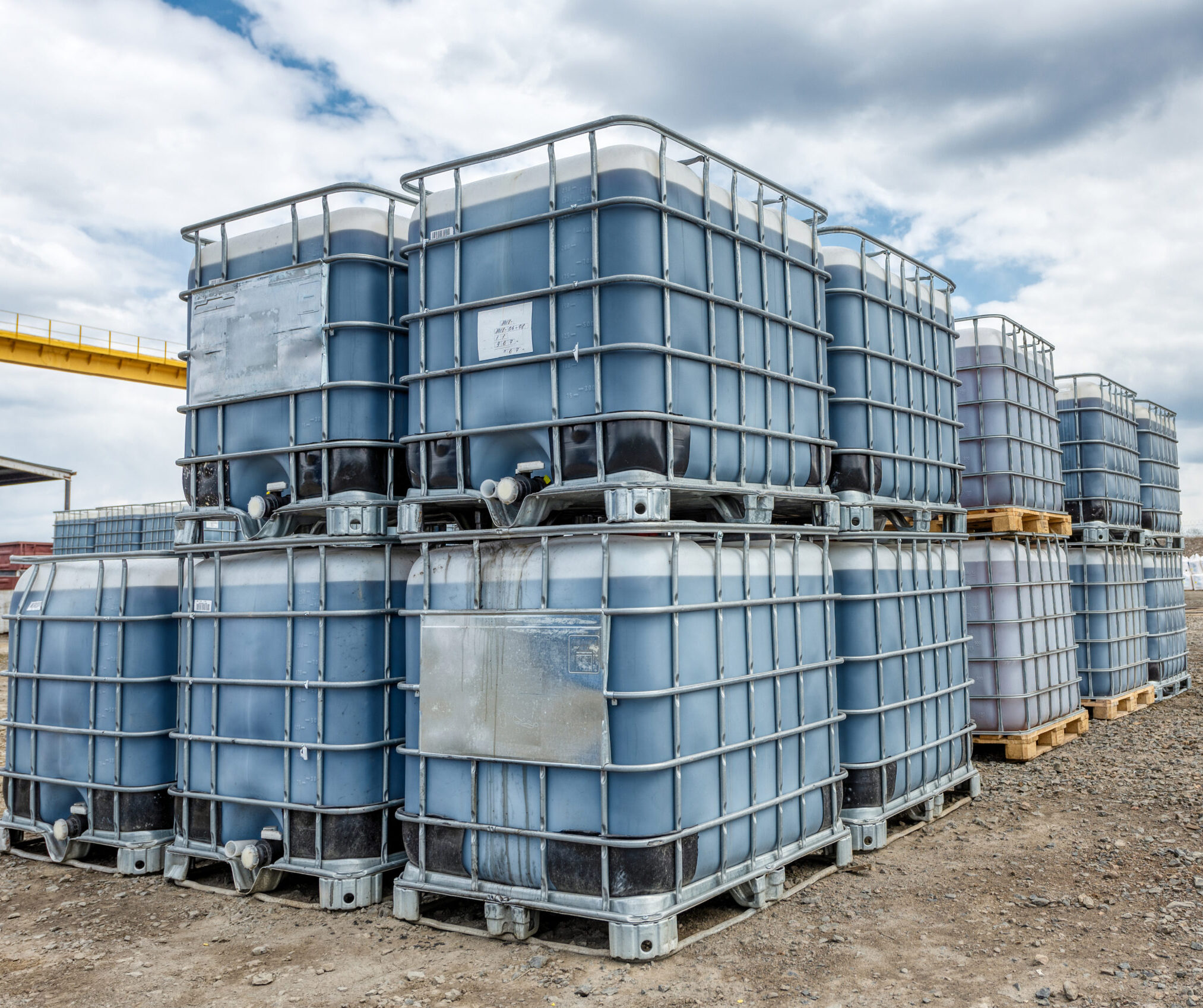 Plastic,Tanks,For,Storage,And,Transportation,Of,Chemical,Liquids.,The industrial hazardous scaled e1697095769750